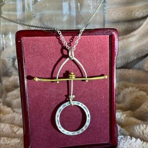 Elegant Silver and Gold Pendant Necklace